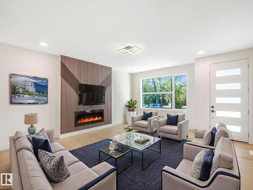 10963 129 St Nw, Edmonton, AB - Indoor Photo Showing Living Room With Fireplace