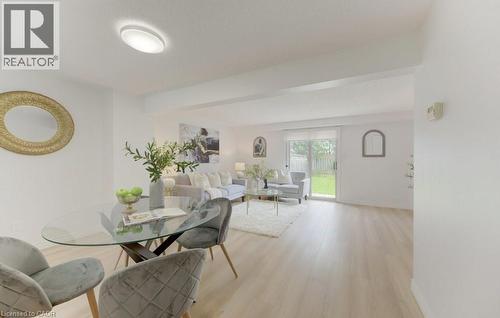 Open-concept living space featuring light wood-finish flooring - 603 Pinerow Crescent Unit# B, Waterloo, ON 