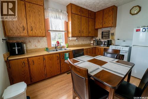 300 Carson Street, Dundurn, SK - Indoor Photo Showing Kitchen With Double Sink