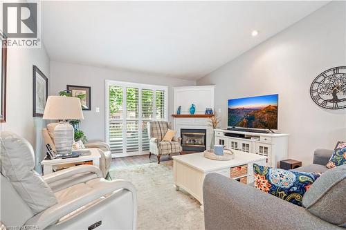 24 Griffiths Drive Unit# 9, Paris, ON - Indoor Photo Showing Living Room With Fireplace