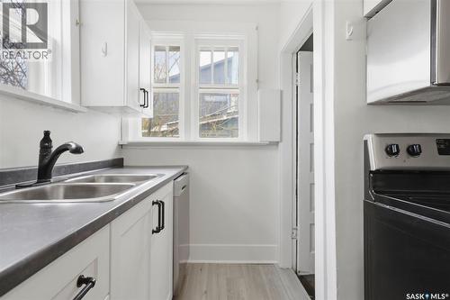 825 L Avenue S, Saskatoon, SK - Indoor Photo Showing Kitchen With Double Sink