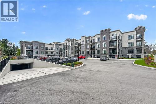 Underground parking entrance - 153 Wilson Street W Unit# 310, Ancaster, ON - Outdoor With Balcony With Facade