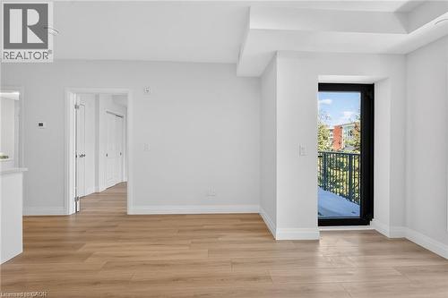 With Walk Out to Balcony - 153 Wilson Street W Unit# 310, Ancaster, ON - Indoor Photo Showing Other Room