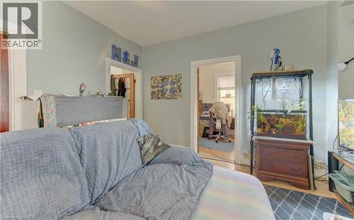 Light gray wall paint with white trim throughout - 48 Breithaupt Street, Kitchener, ON - Indoor Photo Showing Bedroom