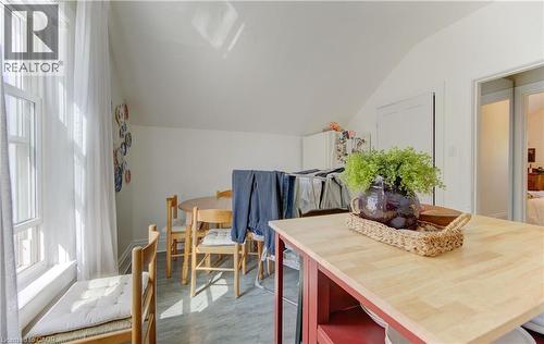 Upper unit kitchen in-area dining with sloped ceiling, and natural window light - 48 Breithaupt Street, Kitchener, ON - Indoor Photo Showing Dining Room