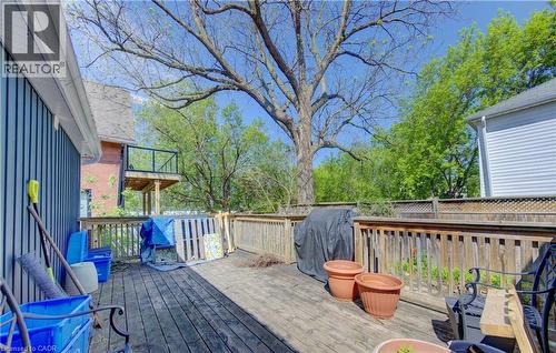 Expansive wood deck outdoor sitting/ entertaining area with a full wood railing - 48 Breithaupt Street, Kitchener, ON - Outdoor With Deck Patio Veranda