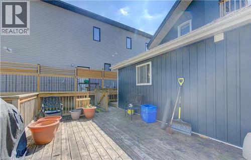 Expansive outdoor deck featuring wood flooring and railings - 48 Breithaupt Street, Kitchener, ON - Outdoor With Deck Patio Veranda With Exterior