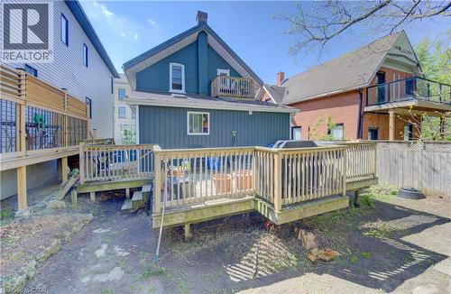 Expansive sun-filled wooden deck featuring natural wood railings - 48 Breithaupt Street, Kitchener, ON - Outdoor