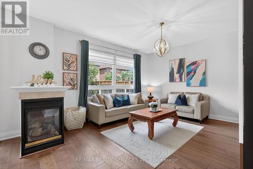 3365 Destination Drive, Mississauga, ON - Indoor Photo Showing Living Room With Fireplace