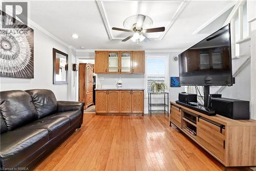 Hardwood flooring throughout the main living space - 23 Britannia Avenue, Hamilton, ON - Indoor