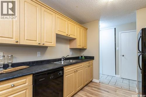14 3809 Luther Place, Saskatoon, SK - Indoor Photo Showing Kitchen With Double Sink