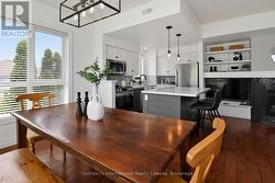Dining room has corner windows all around - 