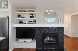Stunning built in fireplace w/tv - 