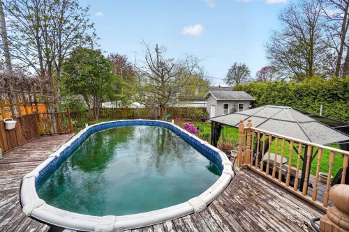 Piscine - 235 Rue Félix-Leclerc, Lavaltrie, QC - Outdoor With Above Ground Pool With Deck Patio Veranda With Backyard