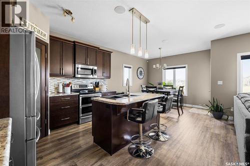 5044 Crane Crescent, Regina, SK - Indoor Photo Showing Kitchen With Double Sink With Upgraded Kitchen