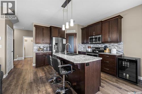 5044 Crane Crescent, Regina, SK - Indoor Photo Showing Kitchen With Double Sink With Upgraded Kitchen