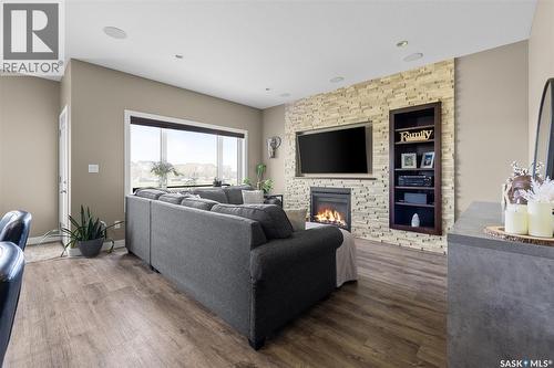 5044 Crane Crescent, Regina, SK - Indoor Photo Showing Living Room With Fireplace