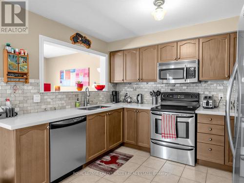 144 Mccready Drive, Milton, ON - Indoor Photo Showing Kitchen With Double Sink