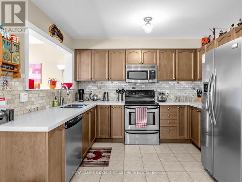 144 Mccready Drive, Milton, ON - Indoor Photo Showing Kitchen With Double Sink