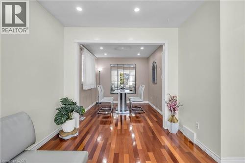 Dining room with recessed lighting and dark wood-type flooring - 146 Bechtel Drive, Kitchener, ON - Indoor