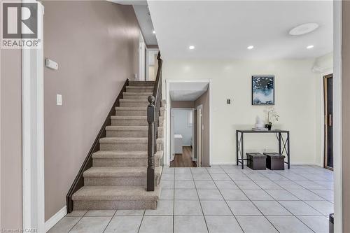 Staircase featuring recessed lighting and tile patterned floors - 146 Bechtel Drive, Kitchener, ON - Indoor Photo Showing Other Room