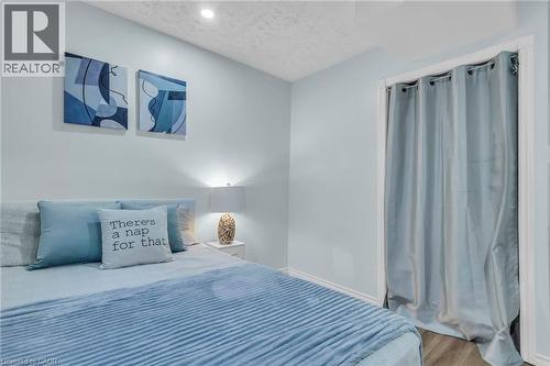 Bedroom with a textured ceiling and wood finished floors - 146 Bechtel Drive, Kitchener, ON - Indoor Photo Showing Bedroom