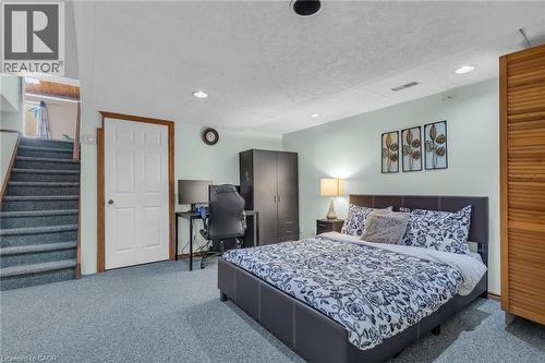 Bedroom with a desk, carpet, and a textured ceiling - 146 Bechtel Drive, Kitchener, ON - Indoor Photo Showing Bedroom