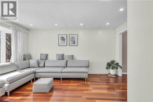 Living room featuring wood finished floors and recessed lighting - 146 Bechtel Drive, Kitchener, ON - Indoor Photo Showing Living Room