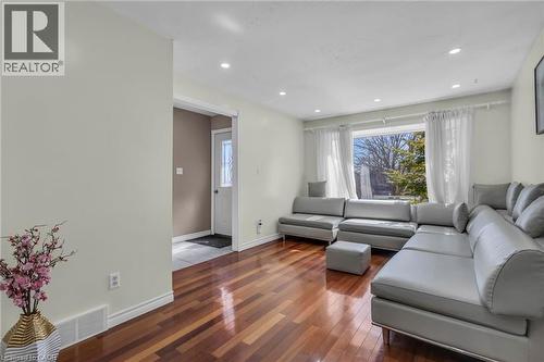 Living room featuring wood-type flooring and recessed lighting - 146 Bechtel Drive, Kitchener, ON - Indoor Photo Showing Living Room