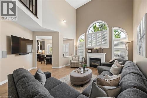 697 Breakwater Crescent, Waterloo, ON - Indoor Photo Showing Living Room With Fireplace