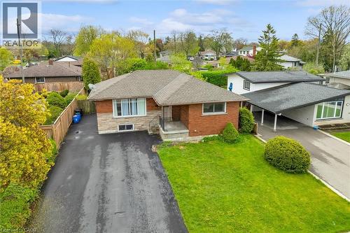 Brick and stone facade residence with an asphalt shingle roof - 46 Beaconsfield Drive, Hamilton, ON - Outdoor