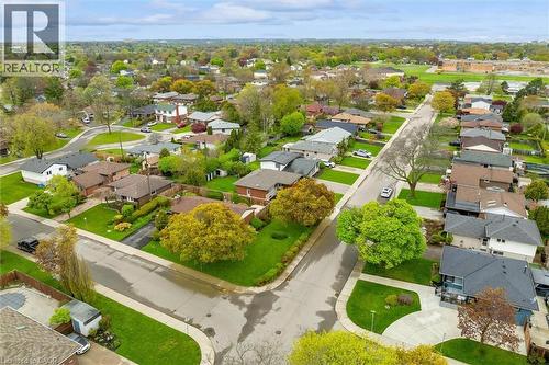 Residential neighborhood with established homes and mature trees, featuring paved streets and manicured lawns - 46 Beaconsfield Drive, Hamilton, ON - Outdoor With View