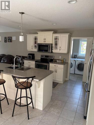 Main Level - 204 Peach Tree Boulevard, St. Thomas, ON - Indoor Photo Showing Kitchen With Double Sink
