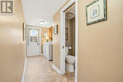 Laundry room with access to basement - 