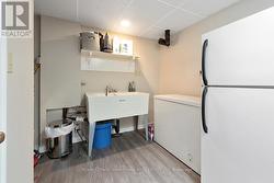 Storage Room w Sewage Pump on lower level - 