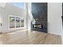 8727 181 Av Nw, Edmonton, AB  - Indoor Photo Showing Living Room With Fireplace 