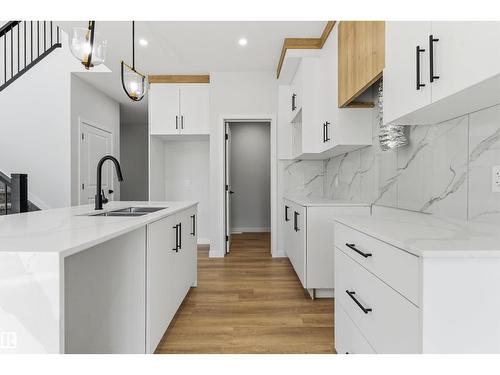 8727 181 Av Nw, Edmonton, AB - Indoor Photo Showing Kitchen With Double Sink