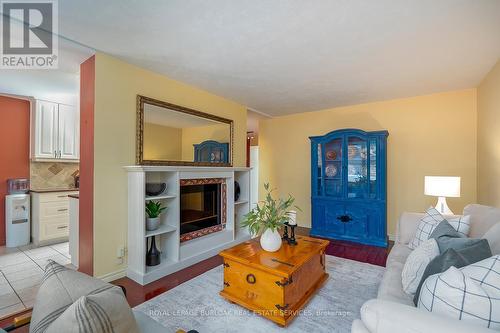 203 - 69 Herkimer Street, Hamilton, ON - Indoor Photo Showing Living Room With Fireplace