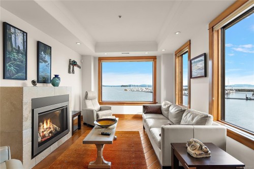 101-9949 Third St, Sidney, BC - Indoor Photo Showing Living Room With Fireplace