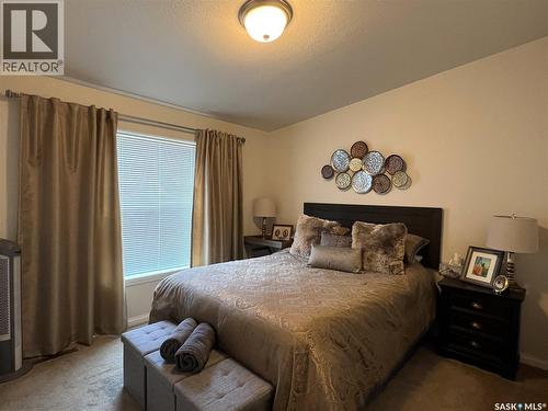208 2Nd Avenue Se, Dorintosh, SK - Indoor Photo Showing Bedroom