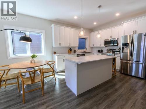 36 Eugene Avenue, Whitehorse, YT - Indoor Photo Showing Kitchen With Double Sink