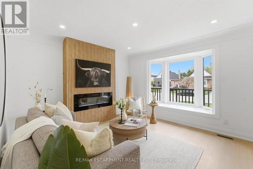 374 East 13Th Street, Hamilton, ON - Indoor Photo Showing Living Room With Fireplace