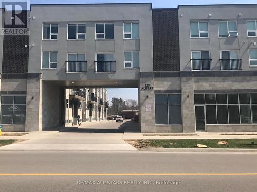 219 - 338 Albert Street, Waterloo, ON - Outdoor With Facade