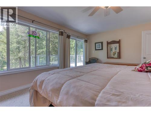 2693 Osachoff Road, South Slocan, BC - Indoor Photo Showing Bedroom