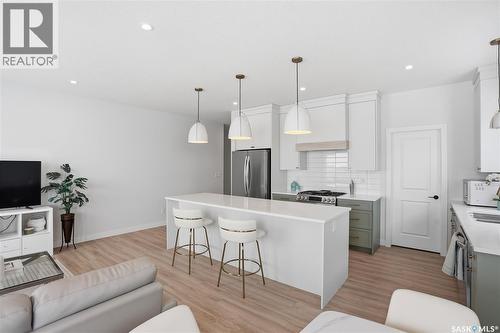20 515 Delainey Road, Saskatoon, SK - Indoor Photo Showing Kitchen With Upgraded Kitchen