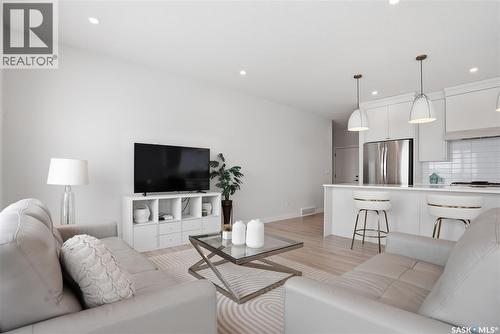 20 515 Delainey Road, Saskatoon, SK - Indoor Photo Showing Living Room