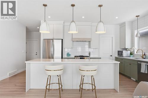 20 515 Delainey Road, Saskatoon, SK - Indoor Photo Showing Kitchen With Upgraded Kitchen