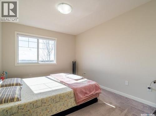 9 5752 Gordon Road, Regina, SK - Indoor Photo Showing Bedroom
