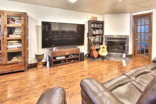 Family Room - 1092 Av. Des Capucines, Saint-Jérôme, QC - Indoor With Fireplace