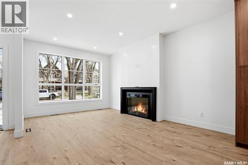 317 11Th Street, Saskatoon, SK - Indoor Photo Showing Living Room With Fireplace